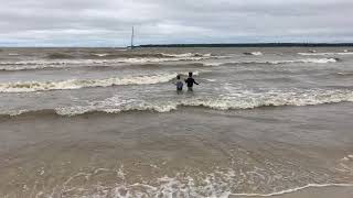 The boys loving the waves at Hillside Beach