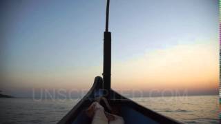 Goan Boat Offshore at Sunset (Stock Footage)