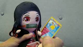 nezuko steals my phone and records herself opening Pokemon cards