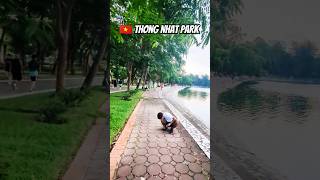 Me Walking along Bay Mau Lake in Thong Nhat Park Talking about Path Social and Social Media