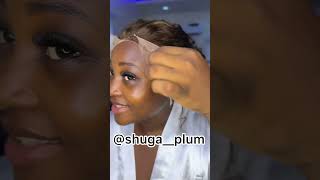 Girls learn how to install frontal wig using only spray glue