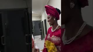 Moses Bliss blowing in tongues before stepping out to their wedding party