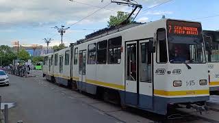 Tramvaiul V3A-93 #145 pe linia 7 parasind statia Piata Unirii