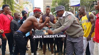 BEAT MY FRIEND AT ARM WRESTLING WIN 200 IN Nairobi) muscle_man_blade