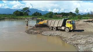 Sand rock loading work from river quarry #river bed materials#river #excavator @Theconstructionlife