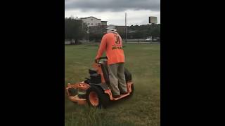 Mowing open field with the Scag