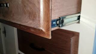 Installing soft-close ball bearing drawer slides on old drawers.