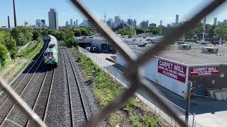 Two GO’s hastily captured at Dundas & the Gerard Square pedestrian bridge