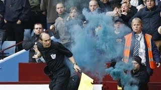 Football Accident - Referee hit by smoke bomb