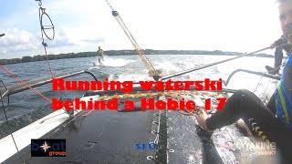 Running waterski behind sailing cat