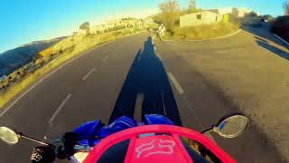 Guy in front is totally awesome at wheelies and jumps (watch this😂)