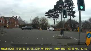 Crossing the path of oncoming traffic at a traffic light controlled crossroads. Quarn.