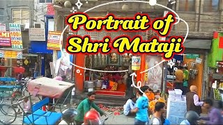 A portrait of Shri Mataji was hung in front of the Sahaja Yoga program.