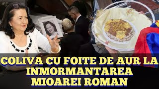 Coliva cu foite de aur, flori albe si  sute de oameni la inmormantarea Mioarei Roman