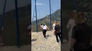 Terrifying moment two Women fall off swing on the edge of 6000ft cliff When Chain Snaps |Russia