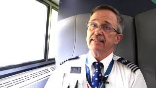 Conductor Jim Nawrocki Prepares Train