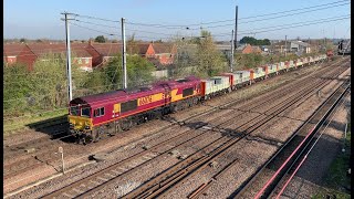 EWS class 66, 66076 propels out of Biggleswade Plasmor yard and departs southbound - 14/04/21