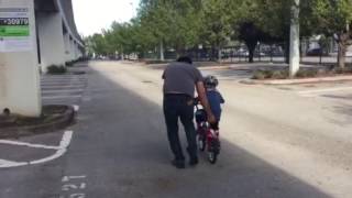 Elijah learning to ride a bike