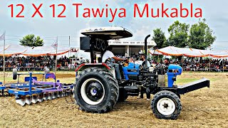 Tawiya Mukabla New Holland 3630 with 12 X 12 Harrow