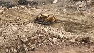 Old CAT dozer working on Quarry