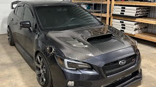 STI GETS CARBON HOOD