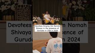 Devotees Singing Om Namah Shivaya in the presence of @Gurudev Sri Sri in USA in 2024