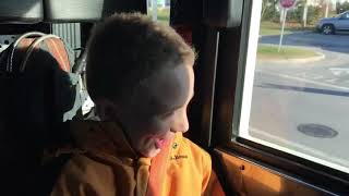 Jacob in the fire truck going to school