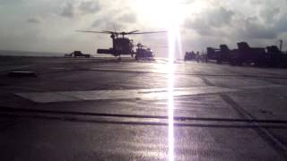 Helo landing on flight deck