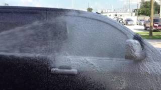 Black Toyota Tundra Platinum getting a foam bath at Mobile Audio & Security