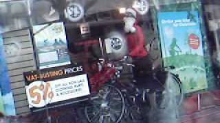 London Bridge: Santa on a Bike Window Display