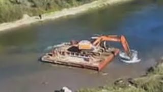 Excavator pushing truck Excavator swimming Funny Compilation