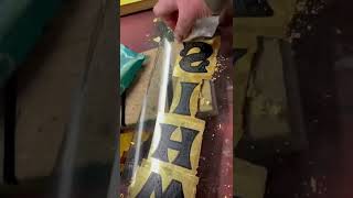 Cleaning away waste gold leaf