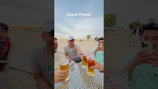 Sopot Poland. Local beer of Poland and white sand beach