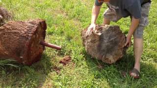 Powder wedge busting wood with black powder