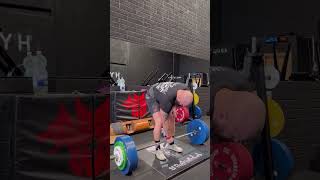 one-handed 250kg deadlift?