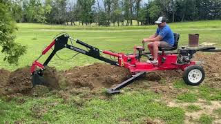 Harbor freight backhoe digging a trench!!