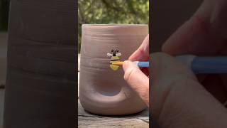 Underglazing a fun little design #pottery #ceramics #underglazepainting #handpainted #bee #painting