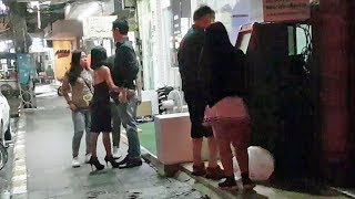 Pattaya Street Girls Helping Foreign Men At ATM.