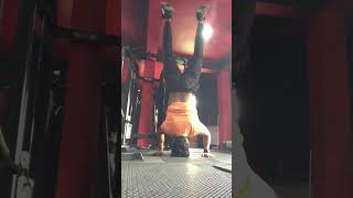 Headstand into chart wheel having fun the gym