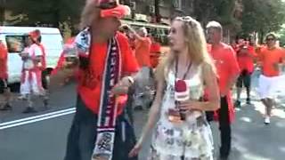 Orange (Holland) fans and girl correspondent. She can't start interview.