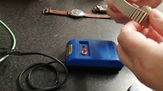 How to demagnetise your mechanical watch using a compass and blue brick of doom degausser