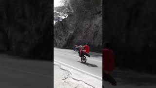 stunting wheelie Shelter Rock old rd Spanish town 250cc