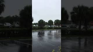 Bicycling in the rain of tropical storm Elsa in Naples Florida