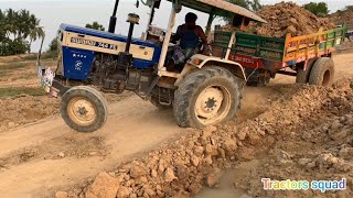 Swaraj 744 stuck in mud with trolley rescue by sonalika did 47 rx 4wd