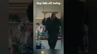 Guy falls off swing