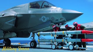 U.S. marines conduct F-35B II Lightning ordnance pro-loading drills aboard USS America