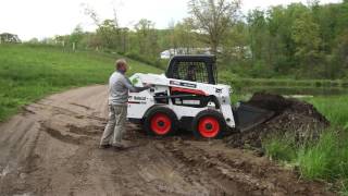 Loading and Unloading the Bucket on a Bobcat Skid Steer