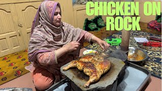 Cooking Juicy And Crispy Whole Chicken In Between Two Stone Rocks