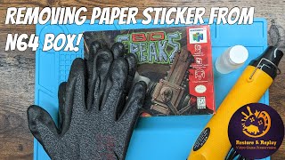 Removing paper sticker from N64 box!