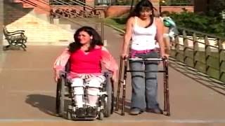 lorene hot discovery polio and paraplegic women wearing leg braces, wheelchair and struggling